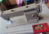 Xyantypical typical industrial sewing machine