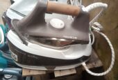 Electric industrial steam iron available