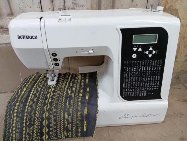 Electric computer designs sewing machine