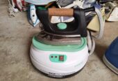 Electric industrial steam iron available