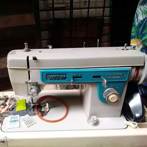 Electric n manual straight sewing zigzag n buttonhole korea