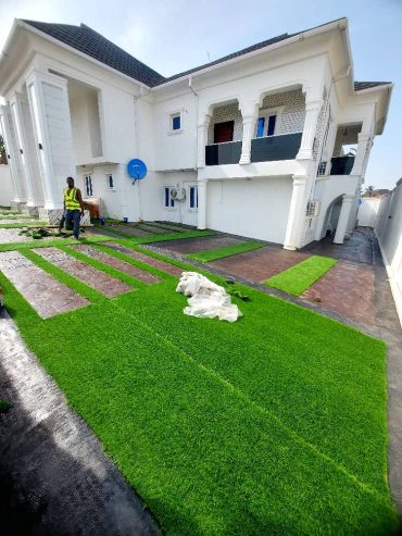 Artificial carpet grass